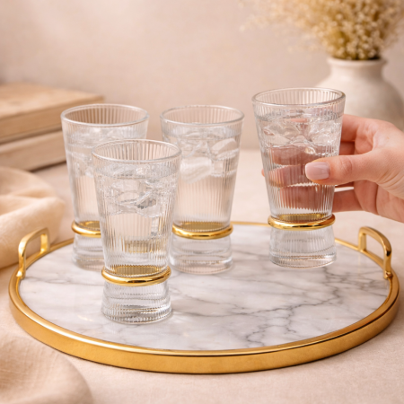 طقم كاسات زجاجية مخططة بقاعدة ذهبية – 12 قطعة